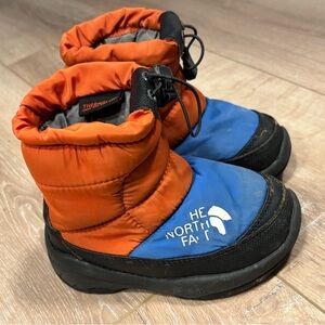 The North Face Vibrant Orange and Blue Boots